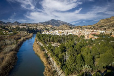 Photo for Panoramic view of the town of Blanca, in the Ricote Valley, Murcia, Spain. The Segura river, with lemon orchards and the city in the background - Royalty Free Image