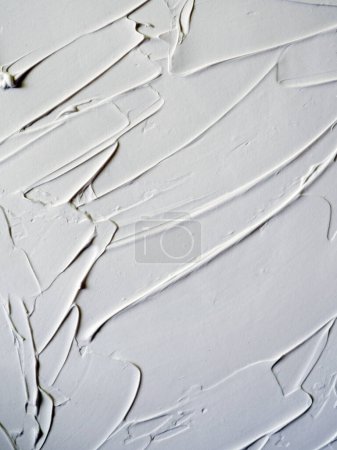 White paint strokes texture. Abstract background.