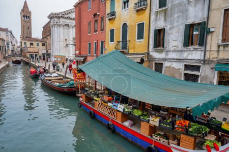 Photo for Venice, Italy- Feb 23, 2023: The floating vegetable market  in Venice. - Royalty Free Image
