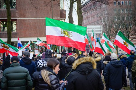 Photo for 21 December 2022, The Hague, Netherlands, Iranian protesters demand from the Dutch House of Representatives to close the Iranian Embassy in the Netherlands and to expel its diplomates due to regime brutality in the Islamic Republic of Iran - Royalty Free Image