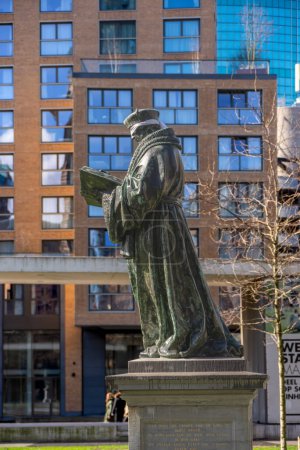 Photo for 27 March 2023, Rotterdam, Netherlands, Climate activists blindfold Desiderius Erasmus statue by sculptor Hendrick de Keyser, as well as statues across the country, calling it "Statue Sunday" - Royalty Free Image