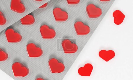 Photo for Blister with heart shaped pills on white background - Royalty Free Image