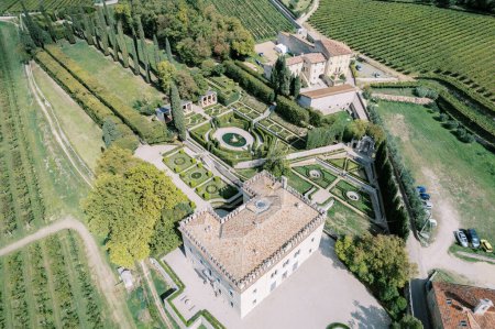 Photo for Green garden with artfully trimmed bushes and hedges near Villa Rizzardi. Valpolicella, Italy. Drone. High quality photo - Royalty Free Image