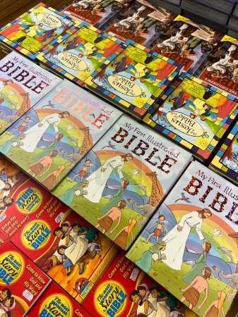 Photo for Colorful children bibles with illustrations lie on the table. High quality photo - Royalty Free Image
