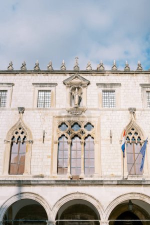 Photo for Statue above the carved windows of the Sponza Palace. Dubrovnik, Croatia. High quality photo - Royalty Free Image