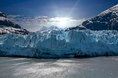 Blue Ice Glacier and water reflection in Glacier Bay National Park, Alaska