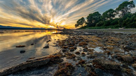 Photo for Beautiful sunset on the shore of Hornby Island at low tide. - Royalty Free Image
