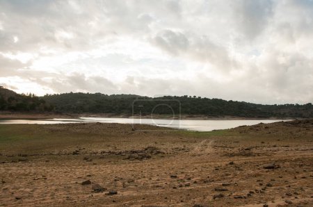 Photo for Dam bed on the Tejo river, in Portugal, without water. It is possible to walk where there should be many cubic meters of water - Royalty Free Image