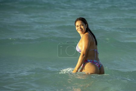 Photo for Beautiful black hair girl mexican latina portrait on the beach in baja california sur - Royalty Free Image