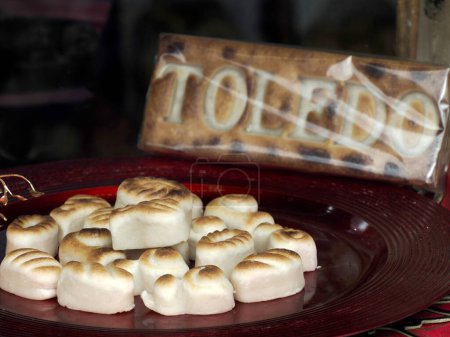 Photo for Toledo Spain christmas Traditional marzipan sweet made with almond mill, eggs, water and sugar in a pastry shop - Royalty Free Image