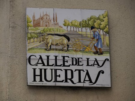 Photo for MADRID, SPAIN - DECEMBER 14, 2022: Street name calle de las huertas sign on in Madrid, capital of Spain renowned for its rich repositories of European art - Royalty Free Image