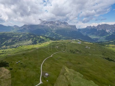 Photo for An Aerial view of Armentarola fields Dolomites Alps near Alta Badia, Trentino-Alto-Adige region, Italy. Summer season. - Royalty Free Image