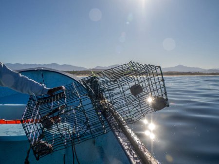 fishing with lobster pot in mexico from boat