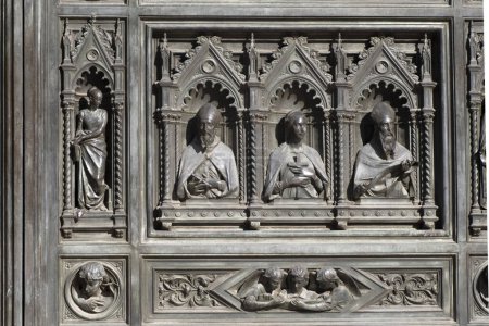 Photo for Florence The Cathedral Santa Maria dei Fiori Italy - detail of door sculpture - Royalty Free Image