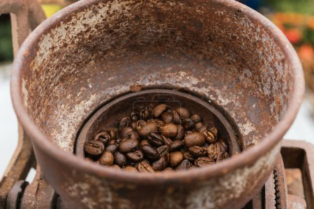 Photo for Coffee beans ready to be ground in a grinding machine. - Royalty Free Image