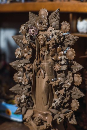 Virgin of Guadalupe made of clay by the hands of a Mexican artisan.