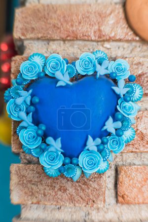 Blue clay heart, traditional Mexican crafts.