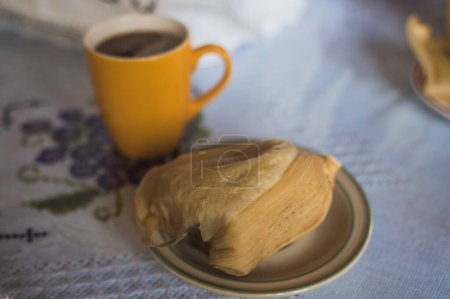 Delicious bread tamale, accompanied by tamarind atole, typical food from Uruapan, Michoacan, Mexico.