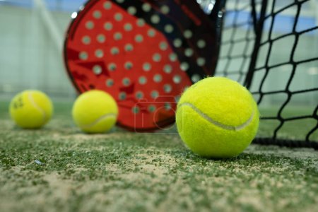 Photo for Rackets and paddle balls on a court ready to play - Royalty Free Image