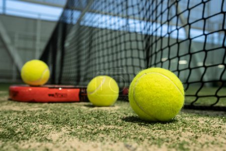 Photo for Rackets and paddle balls on a court ready to play - Royalty Free Image