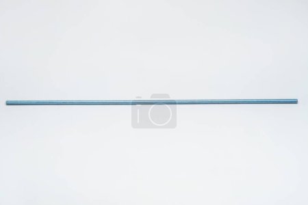 Photo for Iron threaded stud on a white background. metal rod with thread on a light background. construction long bolt with thread for fastening - Royalty Free Image