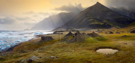 Photo for Scenic volcanic landscape of ancient volcanos and cinder cones near Stafafell in the southwest coast of Iceland - Royalty Free Image