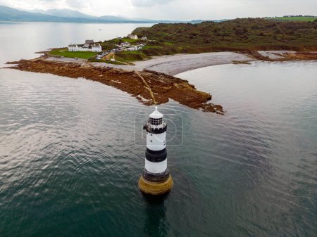 Photo for Aerial view of Penmon Lighthouse on the island of Anglesey in North Wales, United Kingdom. - Royalty Free Image