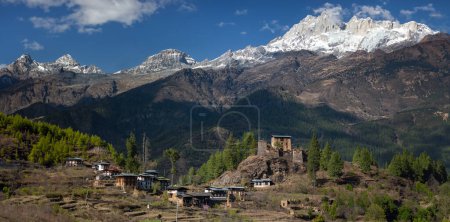 Photo for Drukgyel Dzong - an old Buddhist monastery high in the Himalayas near Paro in the Kingdom of Bhutan. - Royalty Free Image