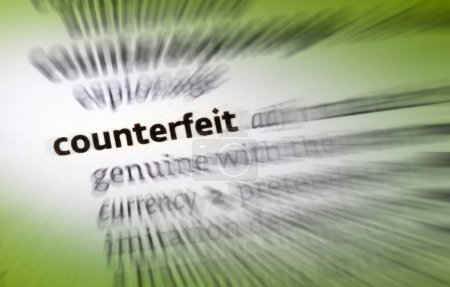 Photo for Counterfeit - an object made in exact imitation of something valuable or important with the intention to deceive or defraud. The word counterfeit frequently describes both the forgeries of currency and documents, as well as the imitations of clothing - Royalty Free Image