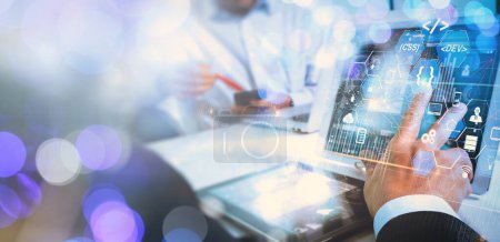 Photo for Coding programmer, Digital technology, software development concept.  software engineer working on laptop with circuit board and javascript on virtual screen, internet of things IoT - Royalty Free Image