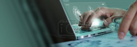 Photo for Cardiologist doctor using laptop computer examine patient heart functions and blood vessel on virtual interface.treatment to diagnose heart disorder and disease of cardiovascular system. - Royalty Free Image