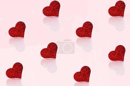 Red hearts on pink. Valentine day background
