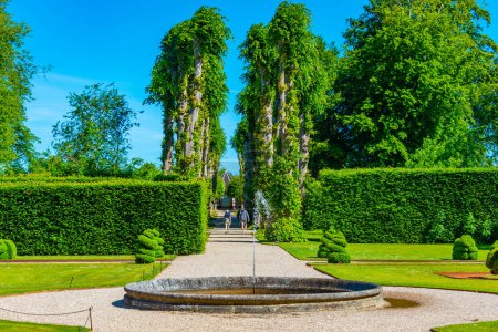 Gardens at Egeskov slot viewed during a sunny day in Denmark.