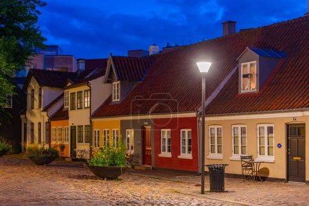 Photo for Night view of a colorful street in the center of Odense, Denmark. - Royalty Free Image