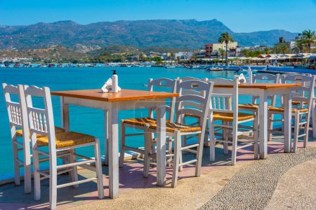 Photo for Restaurants at seaside promenade at Greek town Sitia. - Royalty Free Image
