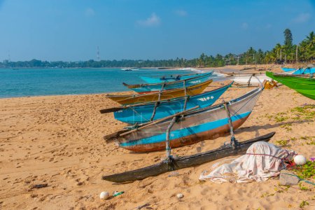 Photo for Fishing boats at Marakolliya beach, Sri Lanka. - Royalty Free Image