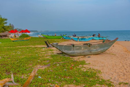 Photo for Fishing boats at Marakolliya beach, Sri Lanka. - Royalty Free Image