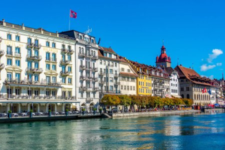 Photo for Luzern, Switzerland, September 20, 2022: Hotels on waterfront of Reuss at Swiss town Luzern. - Royalty Free Image