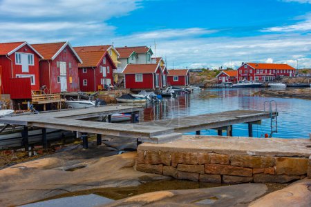 Photo for Smogen, Sweden, July 11, 2022: Colorful wooden sheds at Swedish village Smogen.IMAGE - Royalty Free Image