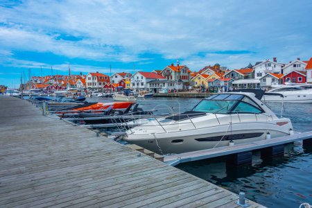Photo for Smogen, Sweden, July 11, 2022: Waterfront promenade at Swedish village Smogen.IMAGE - Royalty Free Image