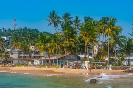 Photo for Mirissa, Sri Lanka, January 23, 2022: Mirissa beach during a sunny day at Sri Lanka. - Royalty Free Image