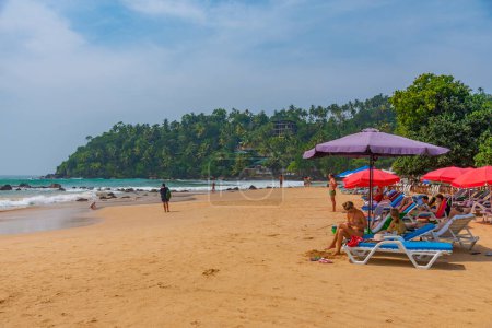 Photo for Mirissa, Sri Lanka, January 23, 2022: Mirissa beach during a sunny day at Sri Lanka. - Royalty Free Image