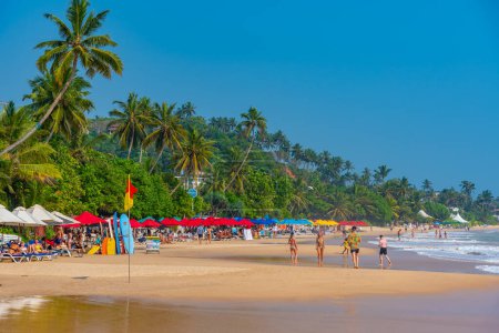 Photo for Mirissa, Sri Lanka, January 22, 2022: Mirissa beach during a sunny day at Sri Lanka. - Royalty Free Image