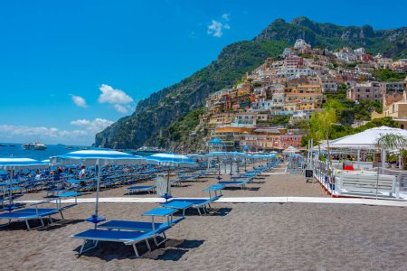 Photo for Positano, Italy, May 21, 2022: Sunny day on the Positano beach, Italy. - Royalty Free Image