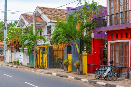 Photo for Negombo, Sri Lanka, February 13, 2022: Colorful houses on a street in Negombo, Sri Lanka. - Royalty Free Image