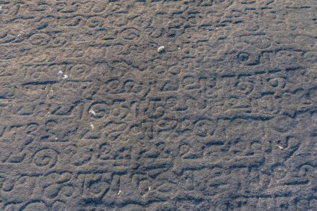 Photo for Kandy, Sri Lanka, February 2, 2022: Rock inscriptions at the Lankathilake temple near Kandy, Sri Lanka. - Royalty Free Image