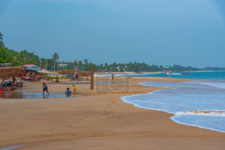 Photo for Tangalle, Sri Lanka, January 23, 2022: Sunny day at Medaketyia beach at Sri Lanka. - Royalty Free Image