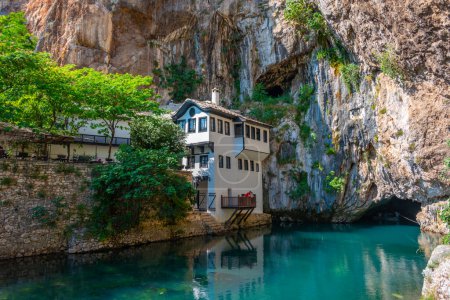 Photo for Blagaj Tekke - Historic Sufi monastery built on the cliffs by the water in Bosnia and Herzegovina - Royalty Free Image