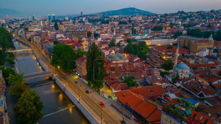 Photo for Sunrise over Mlijacka river in the center of Sarajevo, Bosnia and Herzegovina - Royalty Free Image