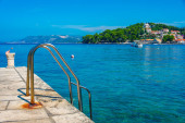 Metal steps leading to the Adriatic sea at Cavtat, Croatia tote bag #712834728